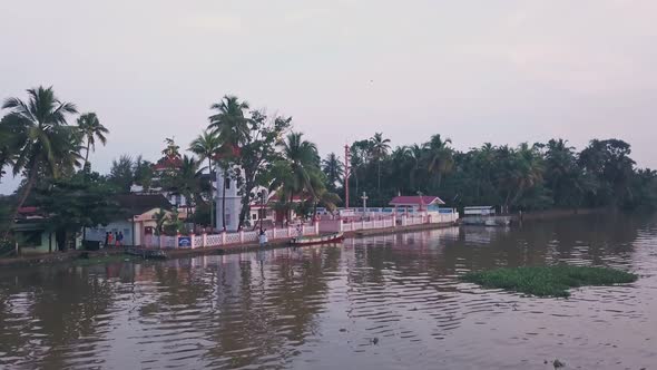 Temple in Kerala backwaters near Alleppey, India. Aerial drone view