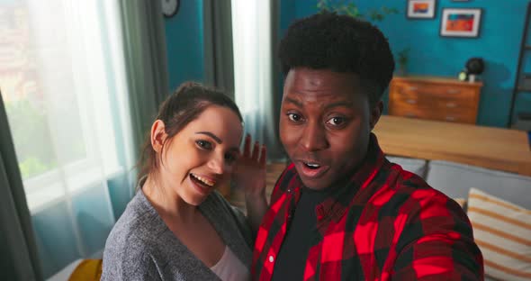 POV Portrait of Cheerful Young Boyfriend and Girlfriend Communicating Via Video Conference with