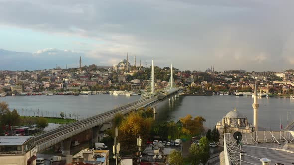 Wide aerial as a drone passes the rooftops of residential buildings in Istanbul Turkey revealing Hal