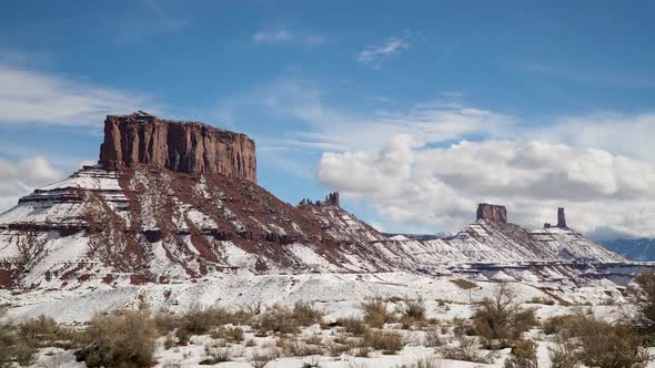 Time lapse viewing desert buttes and towers in Castle Valley during winter