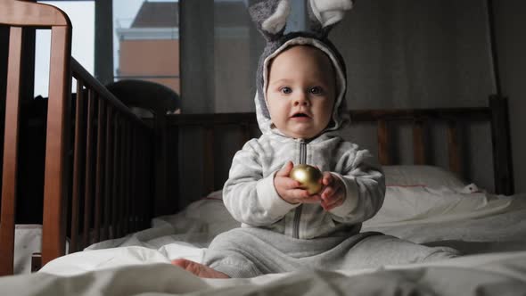 Cute Toddler Baby with Easter Egg