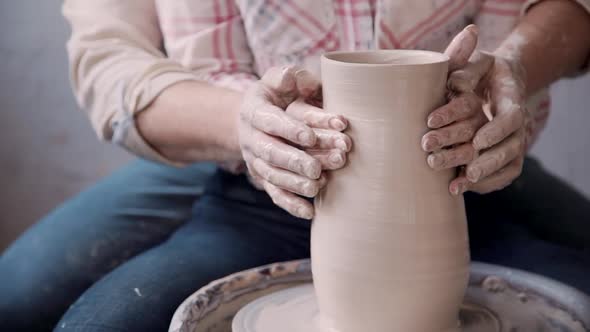 Woman and Man Is Forming and Shaping Clay in Very Romantic and Lovely Way