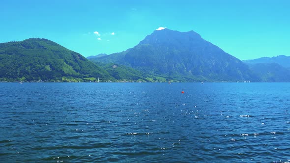 Lake in Austria with Mountains in the Background - Sunny Summer Day