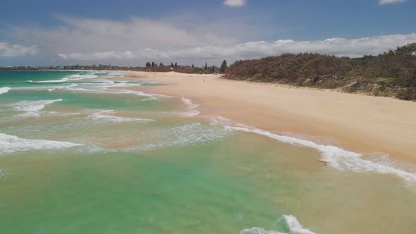 Aerial drone view of beach at Currimundi Lake, Caloundra, Sunshine Coast, Queensland, Australia