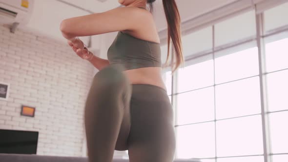 Young Asian woman exercise every morning to stay healthy.