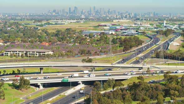 Cars on Motorway with City