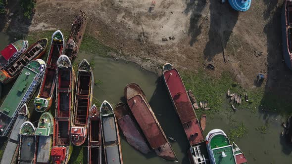 Aerial over beached hulks in various states of ship breaking - illegal site
