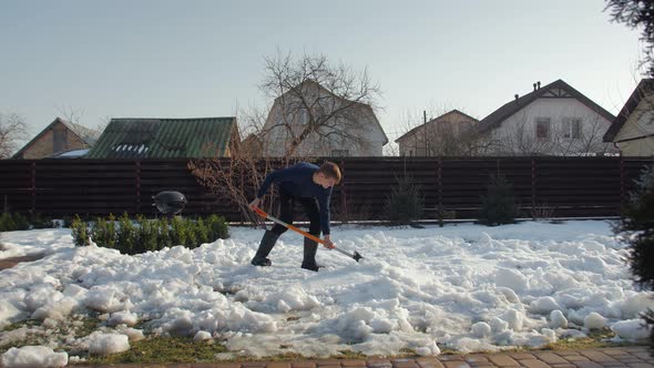 Man Shoveling Snow