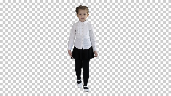 Little serious girl walking towards camera, Alpha Channel