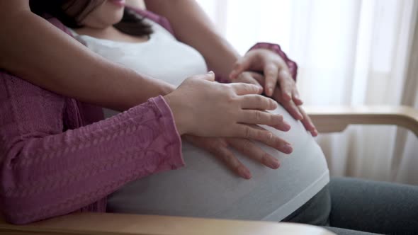 Pregnant Couple Feels Love and Relax at Home