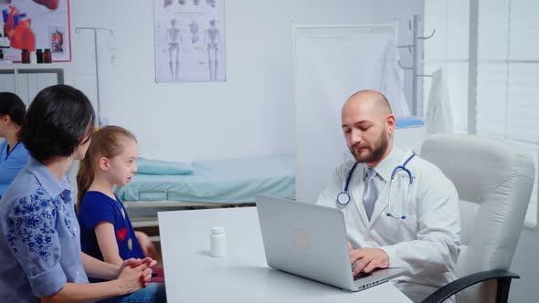 Doctor Examining Child Xray