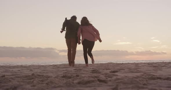 Active senior couple on beach