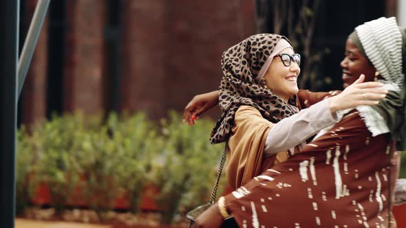 Young Muslim Women Meeting in Park