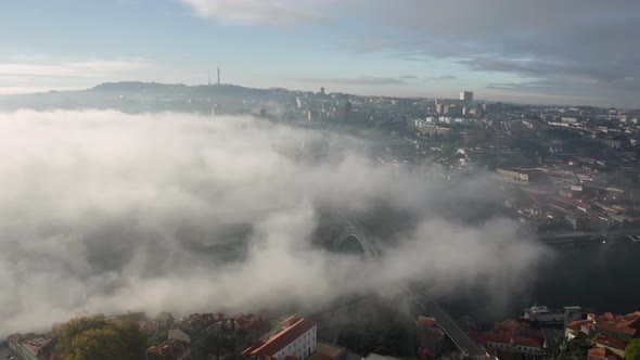 Thick Fog Covers Dense Settlement on the Hillsides of Picturesque City