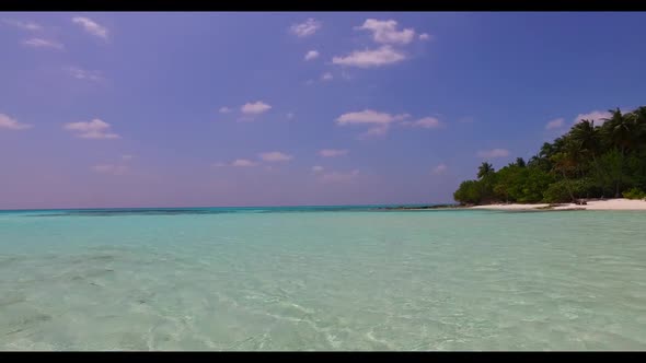 Aerial top view sky of relaxing coast beach voyage by aqua blue sea and white sandy background of a 