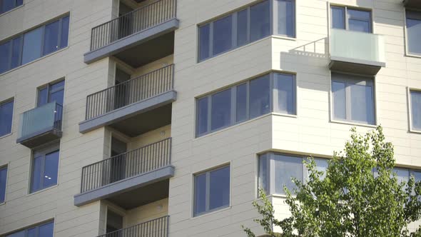 Windows and Balconies of Apartment Building in New Residential Sleeping Area in Moscow