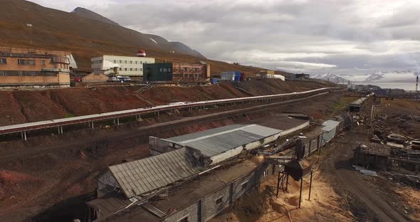 Svalbard Coastline. The Mining Settlement of Barentsburg Against the Arctic Nature.