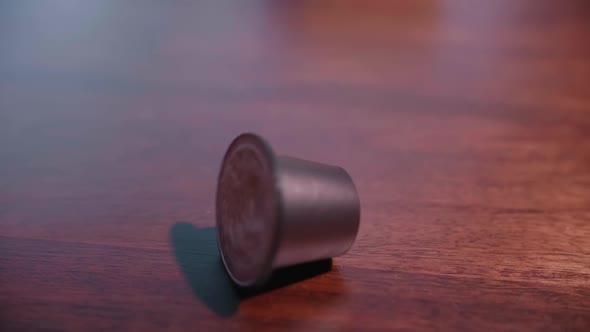 Coffee Pod Falling In Slow Motion