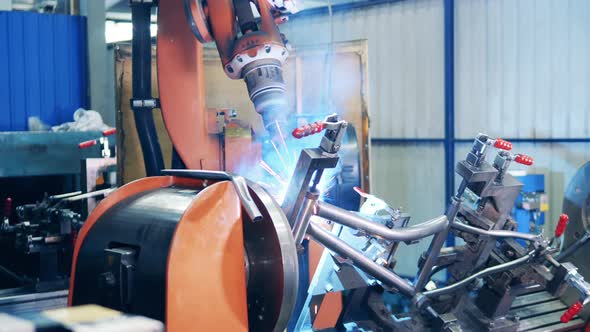 Automated Machine Is Welding Bike Body Frame