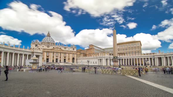 St.Peter's Square Full of Tourists with St.Peter's Basilica and the Egyptian Obelisk Within the