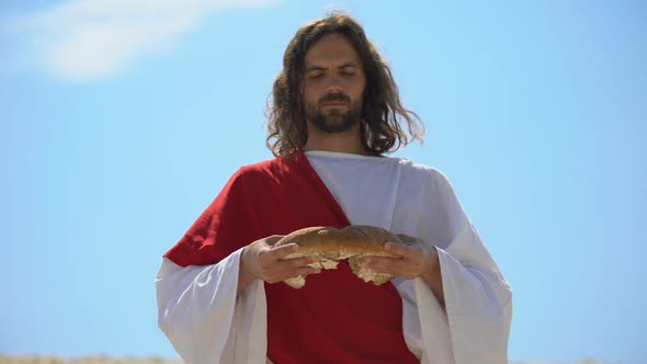 God Breaking Bread Into Two Equal Parts, Justice Concept, Charity to Feed Hungry