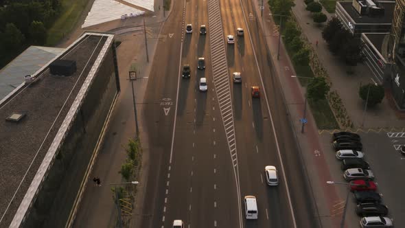 Aerial View Of Modern City Street Traffic In Sunset Light