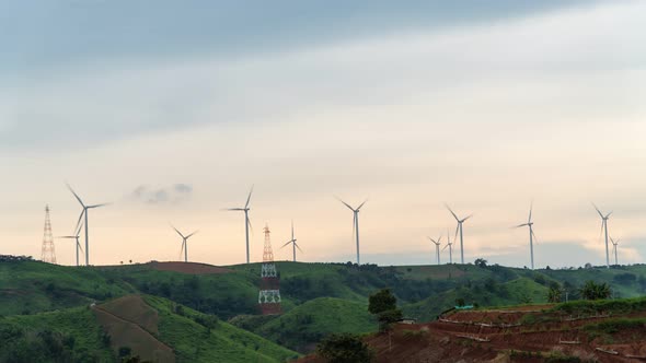 Footage B-roll timelapse power farm wind turbine while sunset time