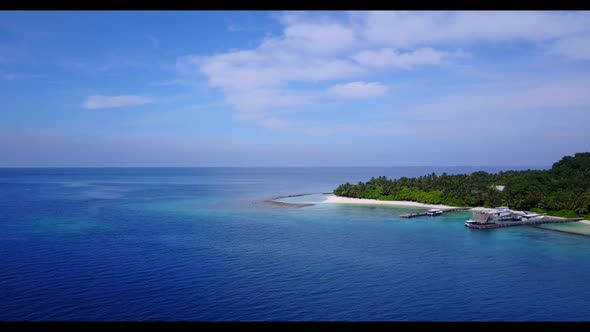Aerial top down landscape of idyllic lagoon beach journey by transparent sea and white sand backgrou