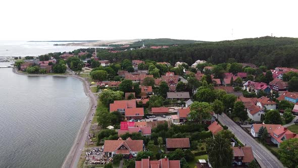 Center of small town Nida with red rooftops, resort of Lithuania, Neringa region