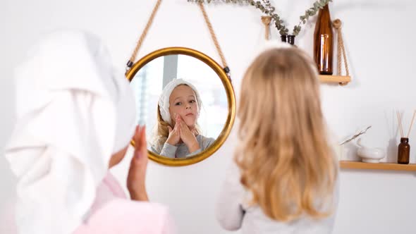 Little Girl with Mom Having Cosmetic Procedures