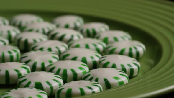 Rotating shot of spearmint hard candies - CANDY SPEARMINT 034