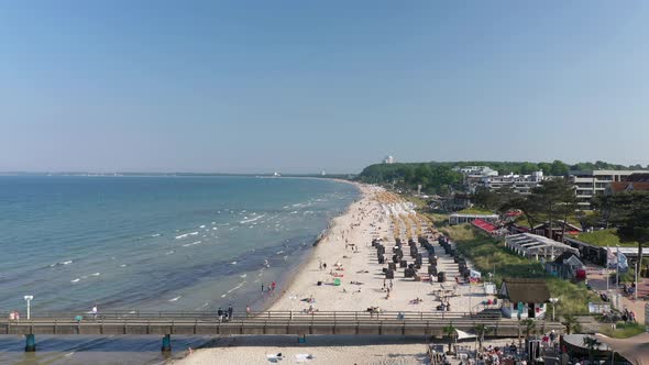 Scharbeutz Beautiful Aerial View of Shoreline Beach with People Sunbathing Enjoying Baltic Sea