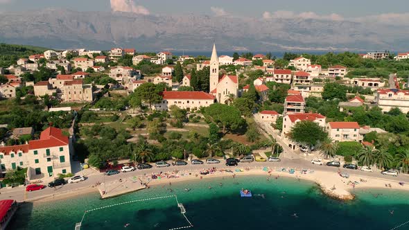 Aerial view of people enjoying the beach at Sumartin, Brac island, Croatia.