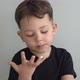 the Little Boy Licks His Fingers - VideoHive Item for Sale