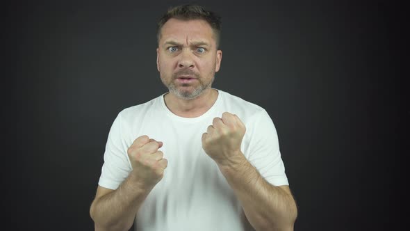 Popular Actor Plays Role of Angry Man Clenching Fists