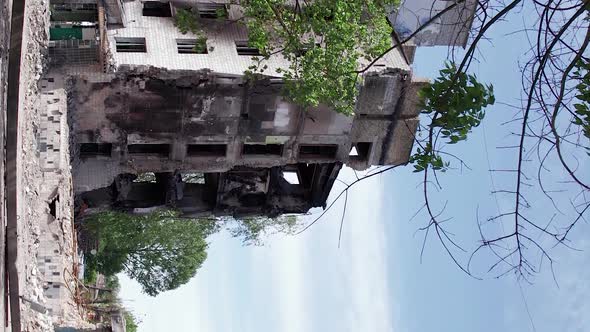 Vertical Video of the Consequences of the War in Ukraine  Burned Cars