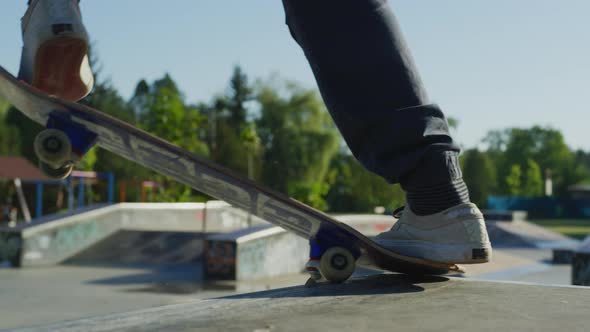 Skateboarder sliding a ramp