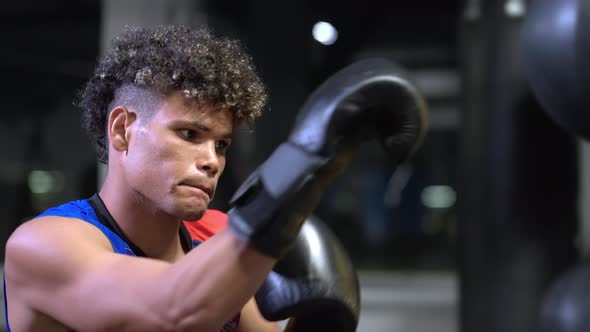 Exercise of Young Professional Boxer in Training Center Portrait of Strong Afro Guy