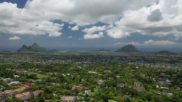 Aerial Photography of the Beautiful Green Countryside of Mauritius with Fields and Mountain Views.