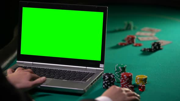 Man Playing Poker Online on Laptop, Betting on Gambling Sites, Green Screen
