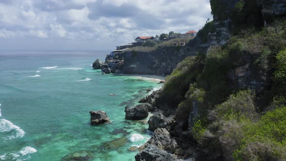 Aerial Drone Flight Over Rocks at Suluban Beach Bali Indonesia