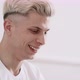 Young Man in White Tshirt Smiling and Talking - VideoHive Item for Sale