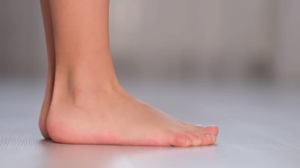Child Rolls From Heel to Toe