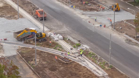 Industrial Truck Loader Excavator Moving Ground and Loading Into a Dumper Truck Timelapse