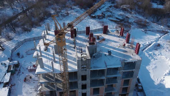 Aerial shot of building residental house on construction site.