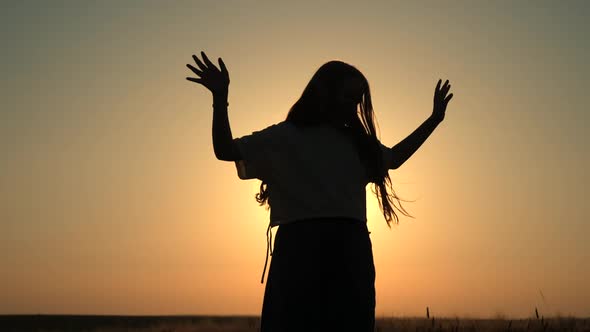 Silhouette of little girl happy time