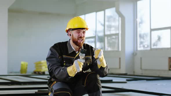 Excited Man Construction Worker at Construction