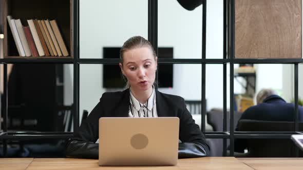 Skype, Woman Doing Online Video chat in Office