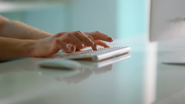 Closeup Hands Typing Keyboard at Modern Office