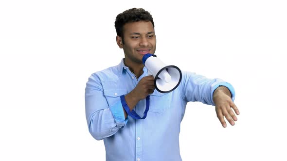 Expressive Man Talking Into Megaphone on White Background